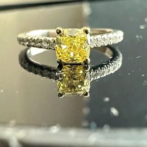 Tiffany NOVO fancy vivid yellow yellow diamond ring in .53 carat.